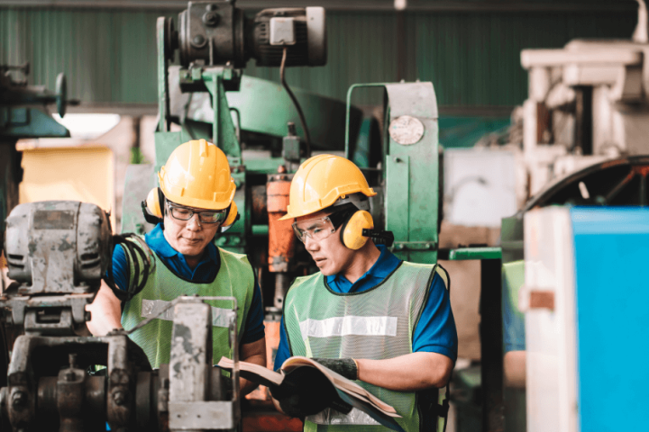 Technicians validating machine performance on site